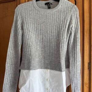 Aqua sweater with faux blues attached.